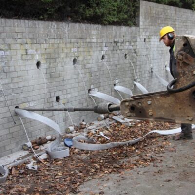 Platipus Platidrain Retaining wall stabilisation – mechanical driving of ground anchors with Platidrain system.